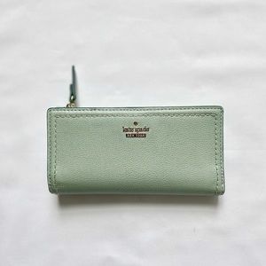 Kate Spade Spencer Slim Bifold Wallet in light teal